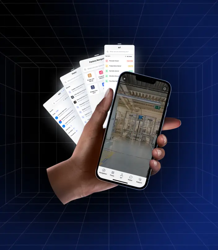 A hand holds a smartphone displaying an augmented reality view of a Matterport digital twin of a factory floor, illustrating a connected worker using the app for real-time information and spatial awareness, with supporting app interfaces showing data and workflows.